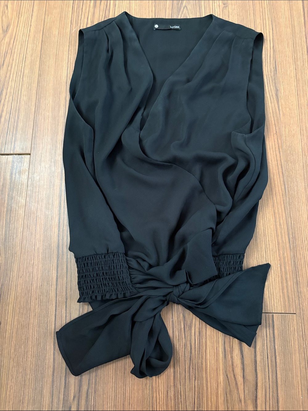 Black Sleeveless Tie-Hem Blouse by tart collections